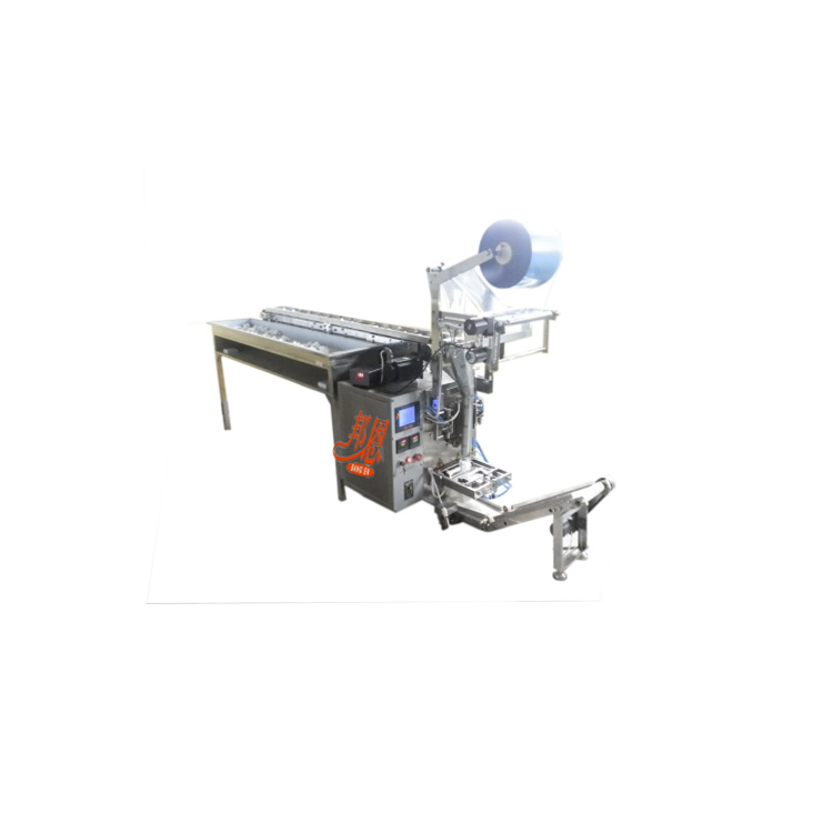 Alcohol cotton ball packaging machine