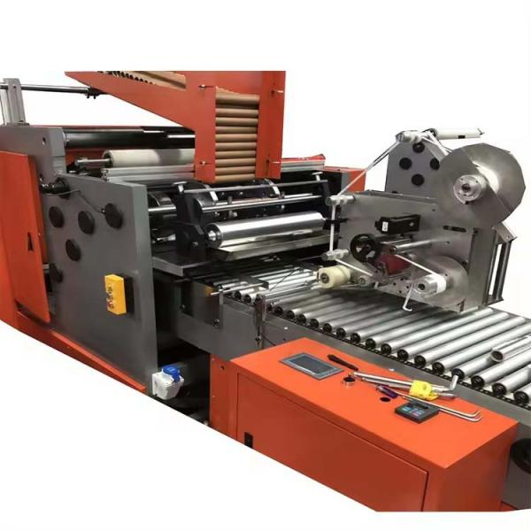 Automatic 4 shafts baking paper rewinder with auto sticker