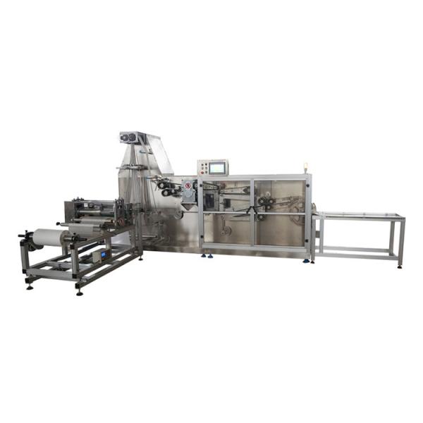 Nonwoven sheet folding and cutting machine