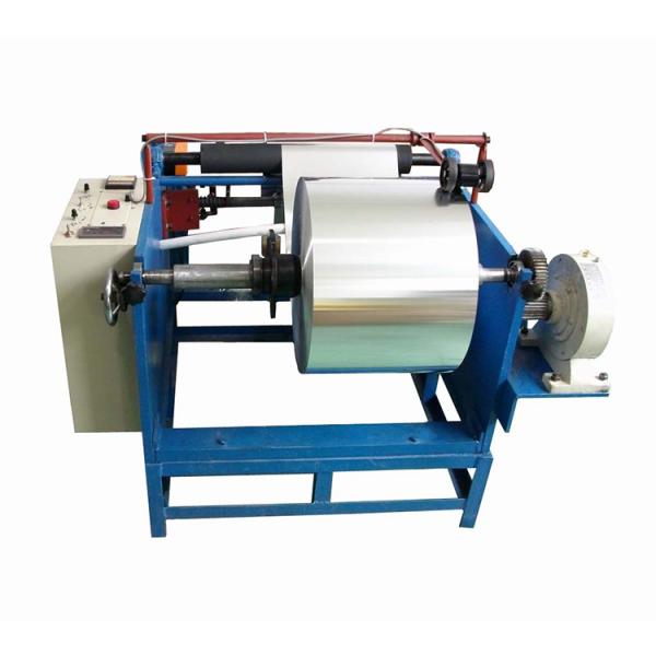 Semi automatic baking paper rewinding machine